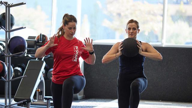 personal trainer and client
