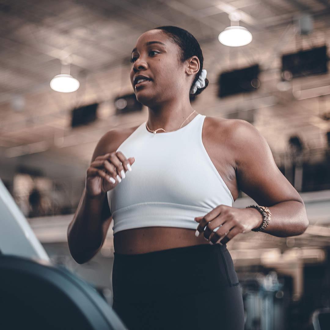 woman running on treadmill